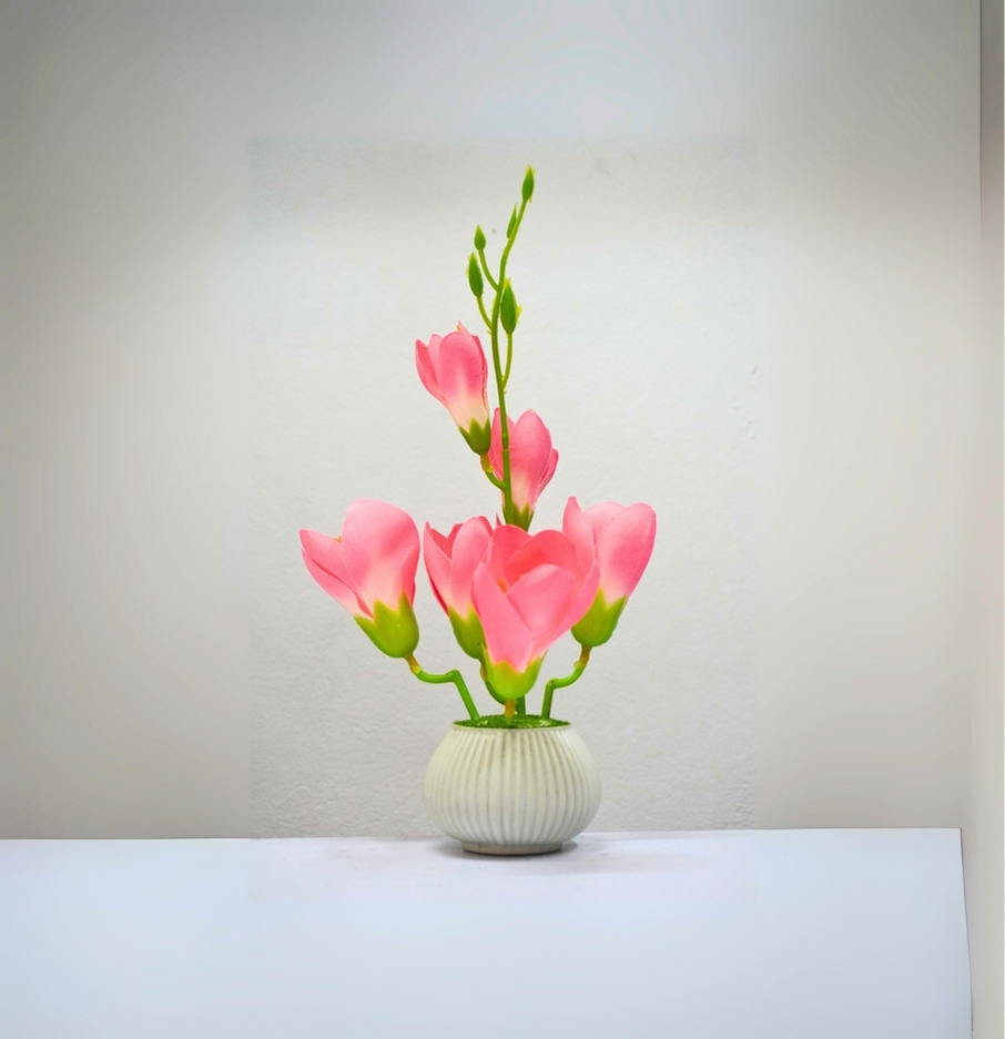 রাউন্ড শেপ টবে কৃত্রিম গোলাপি ফুল – ঘরের সাজসজ্জার জন্য সুন্দর ফুলদানি